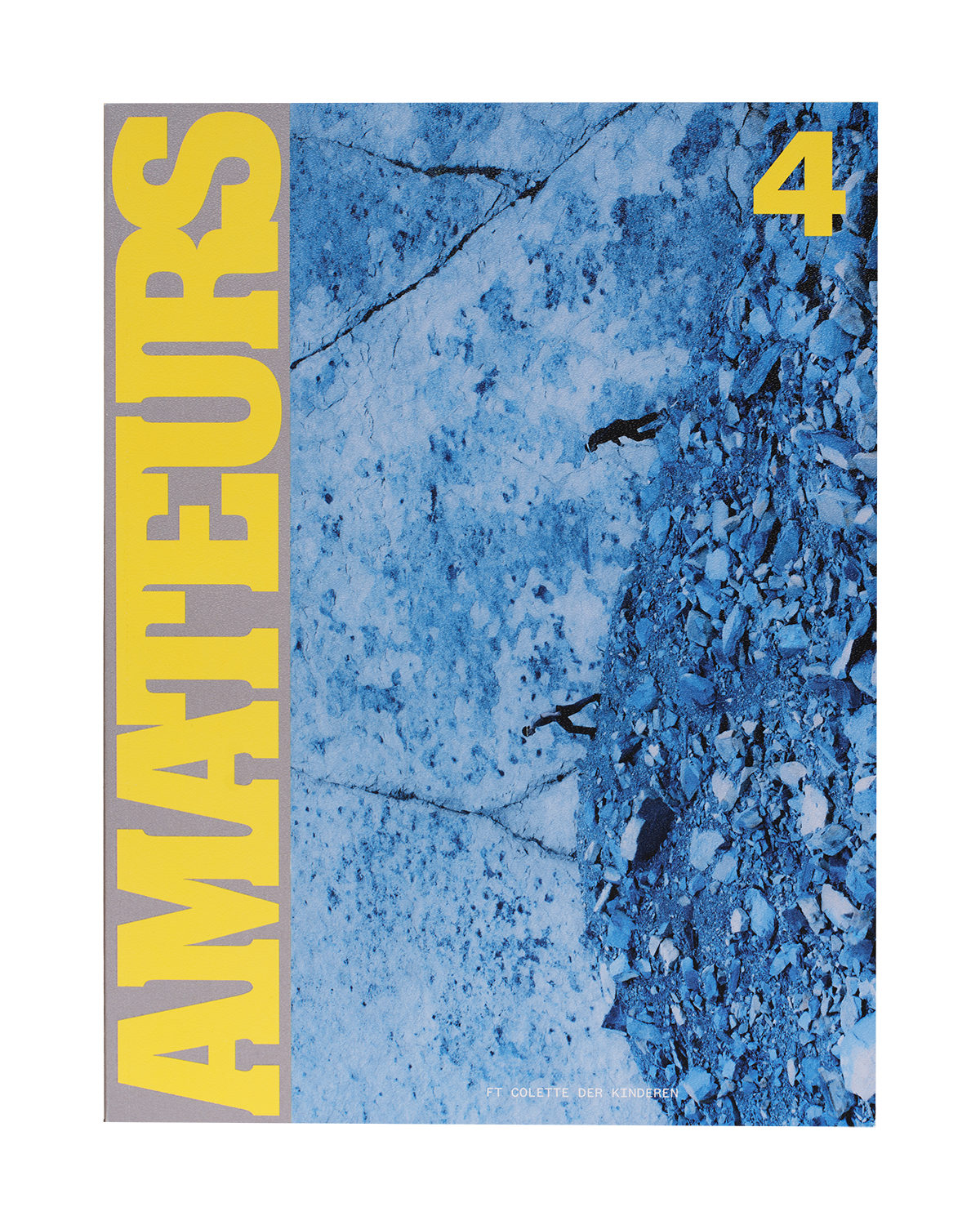Magazine cover with 'Amateurs' text and blue photo of people climbing rocks